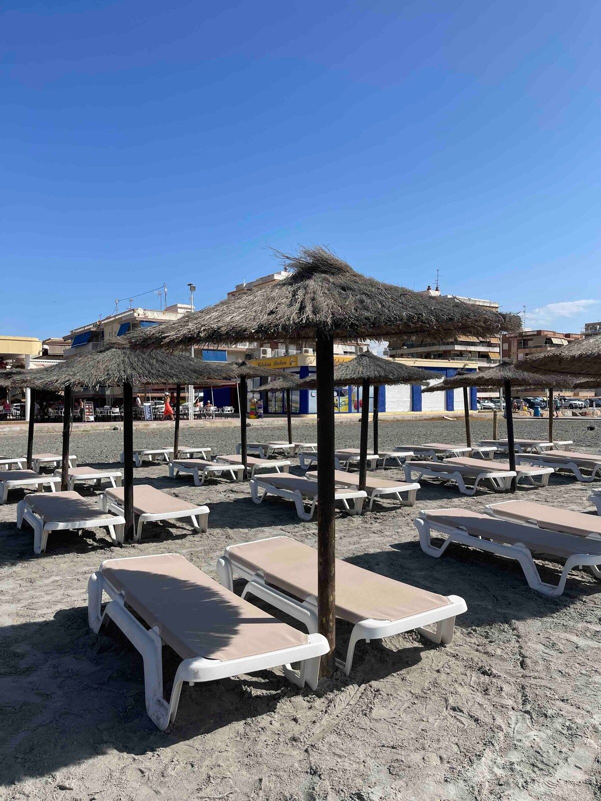 Sun loungers and parasols on the beach