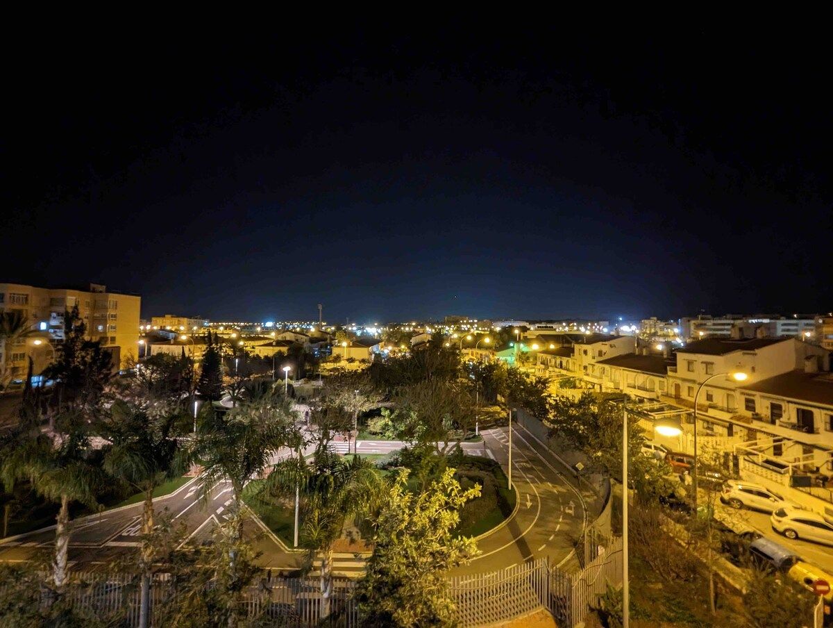 The park and the town at night, seen from the terrace